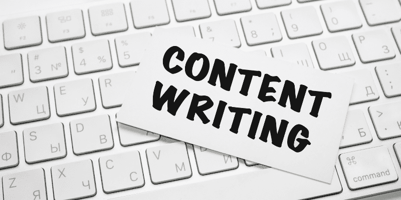 Content writer written on not on white PC keyboard