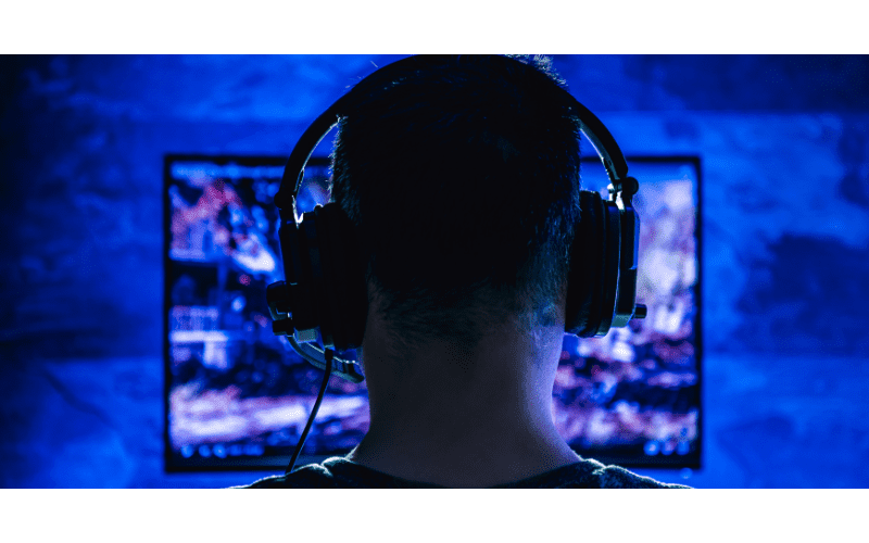 back of head shot of gamer with headphones